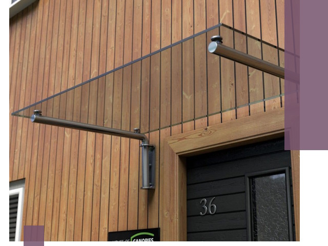 Стеклянные козырьки на входы и фасады в Северодвинске